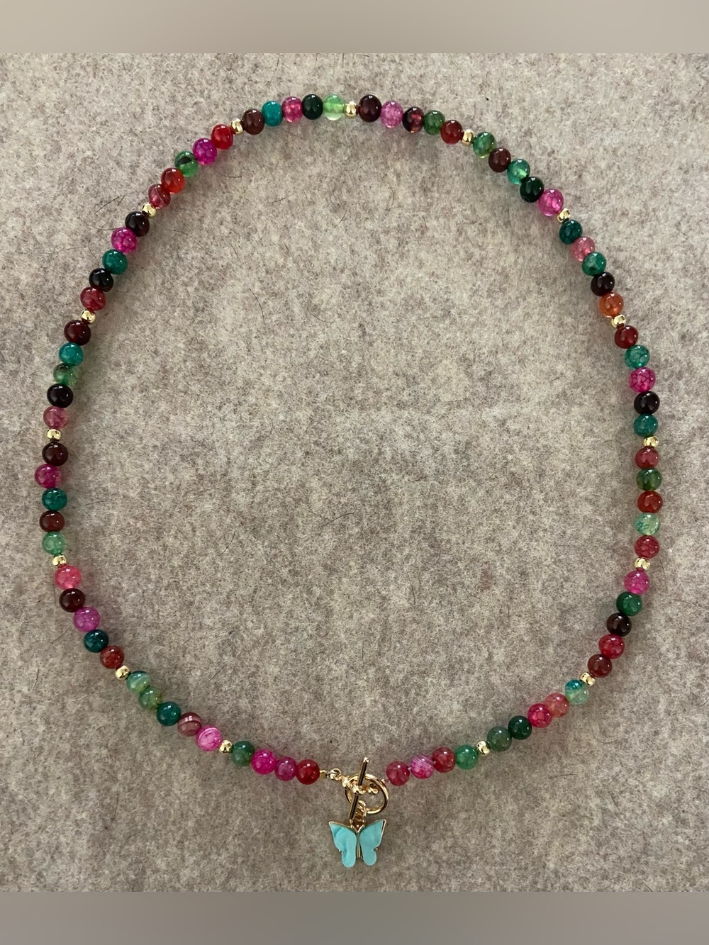 Handmade, Multicolor Beaded Necklace with Blue Butterfly Pendant